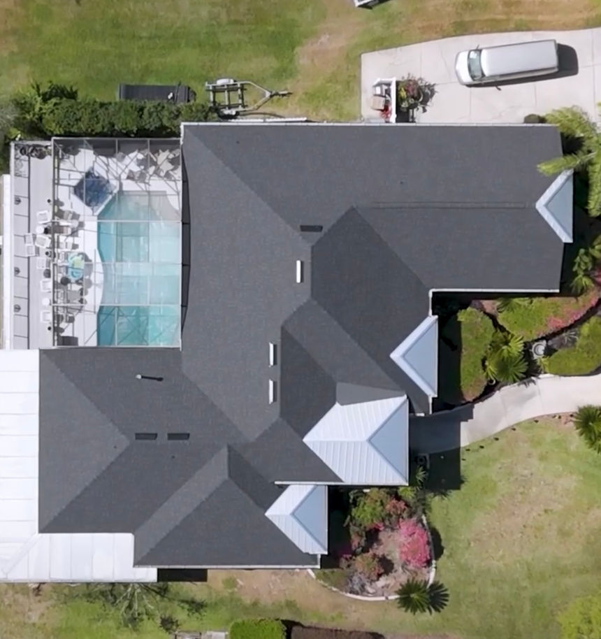 Galvalume accent roof paired with modern black asphalt shingles